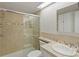 Clean bathroom with a shower/tub combo and updated vanity at 4009 Wonderland Hill Ave, Boulder, CO 80304