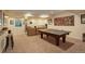 Finished basement with ping pong table and bar area at 5233 E 140Th Pl, Thornton, CO 80602