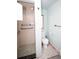 Small bathroom with shower and toilet, needing updating at 4263 S Elati St, Englewood, CO 80110