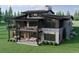Stunning two-story home with expansive windows and a large deck at 6194 Oxford Peak Ln, Castle Rock, CO 80108
