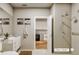 Modern bathroom with double vanity and walk-in shower at 12983 W Ida Ave # 409, Littleton, CO 80127