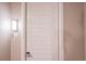 White front door with keyless entry and apartment number at 12983 W Ida Ave # 409, Littleton, CO 80127