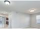 Dining area with light gray walls and hardwood-style flooring at 10049 Granby Dr, Commerce City, CO 80022