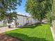 Landscaped backyard with a white mobile home at 8970 Decatur St, Denver, CO 80260