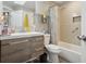 Updated bathroom with tub and modern vanity at 20040 E Wagontrail Dr, Centennial, CO 80015