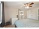 Bright bedroom with ceiling fan and window at 20040 E Wagontrail Dr, Centennial, CO 80015