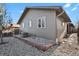 Landscaped backyard with gravel and wood border at 4750 E Louisiana Ave, Denver, CO 80246