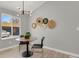 Bright dining area with a round table and chairs, ideal for enjoying meals at 4750 E Louisiana Ave, Denver, CO 80246