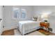 Well-lit bedroom with hardwood floors and a single bed at 3216 Raleigh St, Denver, CO 80212