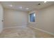 Finished basement with tile flooring and recessed lighting at 2599 S Jebel Way, Aurora, CO 80013