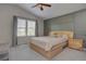 Spacious bedroom with ceiling fan and large windows at 2599 S Jebel Way, Aurora, CO 80013