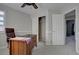 Spacious home office with a large desk and closet at 2599 S Jebel Way, Aurora, CO 80013