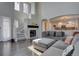 Spacious living room with hardwood floors and a fireplace at 2599 S Jebel Way, Aurora, CO 80013