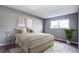 Spacious bedroom with neutral walls and wood-look floors at 50 E Highline Cir # 104, Centennial, CO 80122