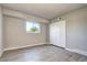 Bright bedroom with neutral walls and vinyl flooring at 50 E Highline Cir # 104, Centennial, CO 80122