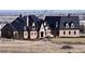 Luxury home with city skyline views in the background at 7755 Moore Rd, Littleton, CO 80125