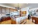 Gourmet kitchen featuring a large island and high-end appliances at 7755 Moore Rd, Littleton, CO 80125