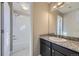 Small bathroom with shower/tub combo and granite vanity at 3423 Princeton Pl, Broomfield, CO 80023