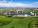 Aerial view of golf course and clubhouse at 1122 S Fultondale Cir, Aurora, CO 80018