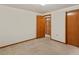 Bright basement bedroom with access to another room at 432 S 8Th St, Berthoud, CO 80513