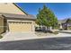 Well-maintained home with attached garage and landscaping at 6655 S Shawnee St, Aurora, CO 80016
