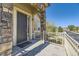 Front entry with dark door and stone accents at 6655 S Shawnee St, Aurora, CO 80016