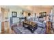 Spacious living room with hardwood floors and high ceilings at 6655 S Shawnee St, Aurora, CO 80016