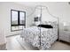 Bedroom with a canopy bed and black and white bedding at 5300 Soledad Cir, Parker, CO 80134