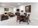 Finished basement featuring a comfortable lounge area and dining space at 5300 Soledad Cir, Parker, CO 80134