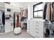 Large walk-in closet with ample shelving and hanging space at 5300 Soledad Cir, Parker, CO 80134