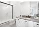 Bathroom with a walk-in shower and a gray quartz countertop at 5300 Soledad Cir, Parker, CO 80134