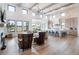 Spacious living room with a stone fireplace and large windows at 5300 Soledad Cir, Parker, CO 80134