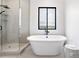 Bathroom boasts a large soaking tub and a walk-in shower at 5300 Soledad Cir, Parker, CO 80134