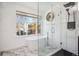 Spa-like bathroom featuring a freestanding soaking tub and a walk-in shower at 4430 E 131St E Pl, Thornton, CO 80241