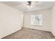 Bright bedroom with carpet and ceiling fan at 16181 E Oxford Dr, Aurora, CO 80013