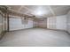 Unfinished garage with single door at 13448 E 103Rd Pl, Commerce City, CO 80022