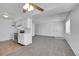 Eat-in kitchen with stainless steel appliances and white cabinets at 9947 Croke Dr, Denver, CO 80260