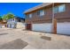 View of attached garages with parking spaces at 9947 Croke Dr, Denver, CO 80260