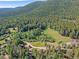 Aerial view of property showing surrounding mountain landscape at 9719 Beaver Pond, Conifer, CO 80433