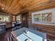 Small dining area with table and chairs near the kitchen at 9719 Beaver Pond, Conifer, CO 80433