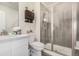 Bathroom with walk-in shower and modern vanity at 19064 W 95Th Ln, Arvada, CO 80007