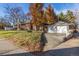 Charming home exterior with brick facade, driveway, and garage at 3601 E 7Th Avenue Pkwy, Denver, CO 80206