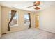 Bedroom with ceiling fan and en-suite bathroom access at 4325 S Hoyt St, Littleton, CO 80123