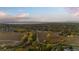 Aerial view of neighborhood with a lake in the distance at 9641 Sierra Dr, Arvada, CO 80005