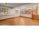 Finished basement offers extra living space with laminate flooring at 9641 Sierra Dr, Arvada, CO 80005