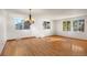 Living room with hardwood floors and lots of natural light at 9641 Sierra Dr, Arvada, CO 80005