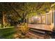 Backyard patio with string lights and access to the kitchen at 9641 Sierra Dr, Arvada, CO 80005