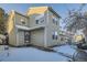 Front view of a two-story townhouse with light beige siding at 3923 E 121St Ave, Thornton, CO 80241