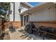 Patio area with seating, grill, and access to the house at 13 Nome Way # A, Aurora, CO 80012