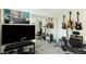 Home office/game room with TV, exercise equipment and plenty of storage at 13 Nome Way # A, Aurora, CO 80012